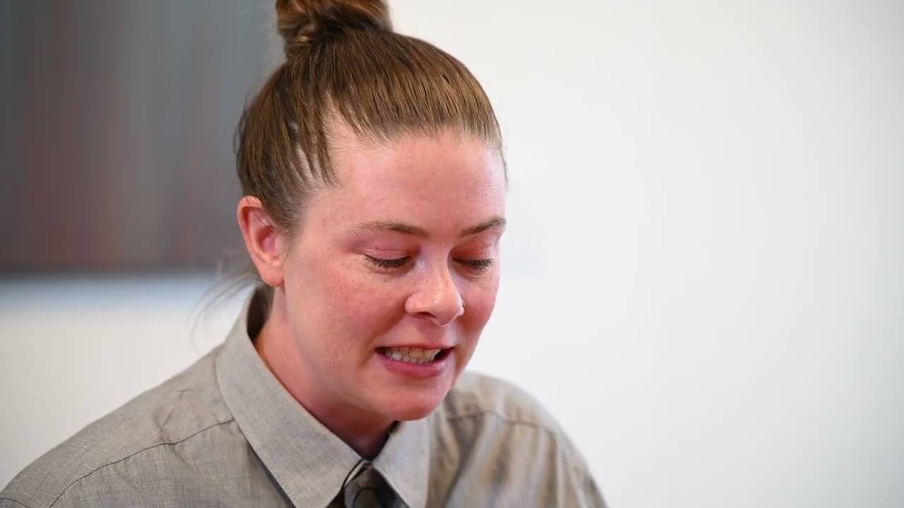 person clenching their teeth